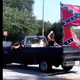 Screenshot captured by partygoers at an African-American family’s birthday celebration appears to show members of Confederate-flag group Respect the Flag taunting those gathered as they left the scene.
NBC News screenshot